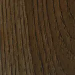 Dark wooden surface with visible grain patterns.