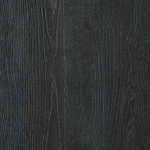 Dark textured wood surface with grain patterns.