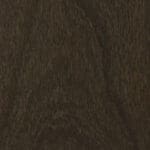 Dark wood texture background with subtle grain.