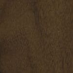 Dark wooden surface with fine texture.