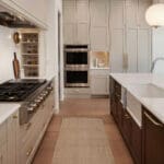 Modern kitchen with island, double ovens, rug